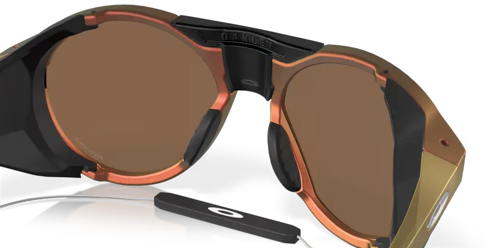 Oakley Okulary przeciwsłoneczne CLIFDEN Coalesce Collection Matte Red Gold Colorshift / Prizm Bronze OO9440-23