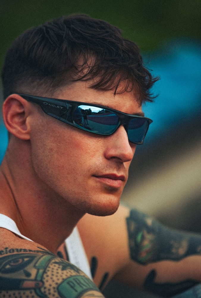 Oakley Okulary przeciwsłoneczne HIGHLAND Crystal Black / Prizm Deep Water Polarized OO9522-04